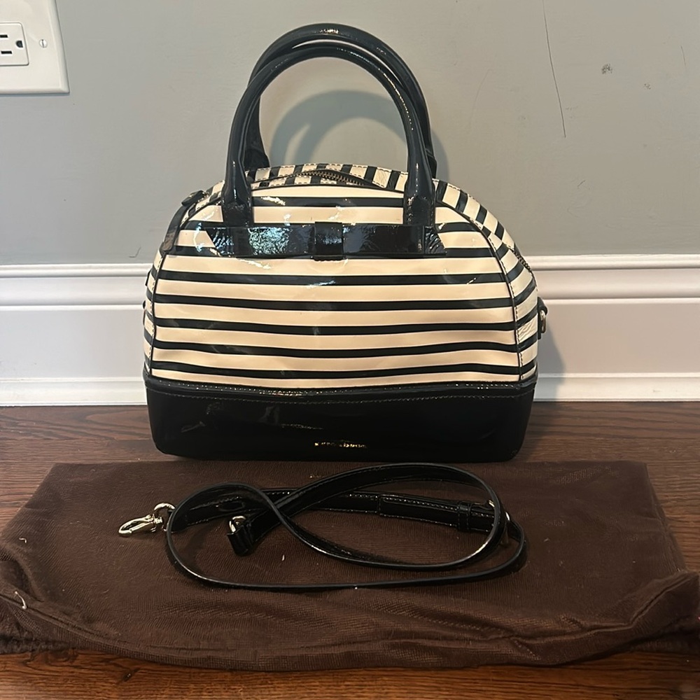 Kate spade purse -black and off white color striped.